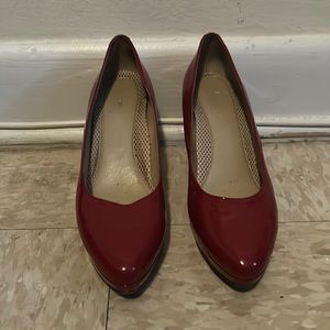 Red patent leather pumps